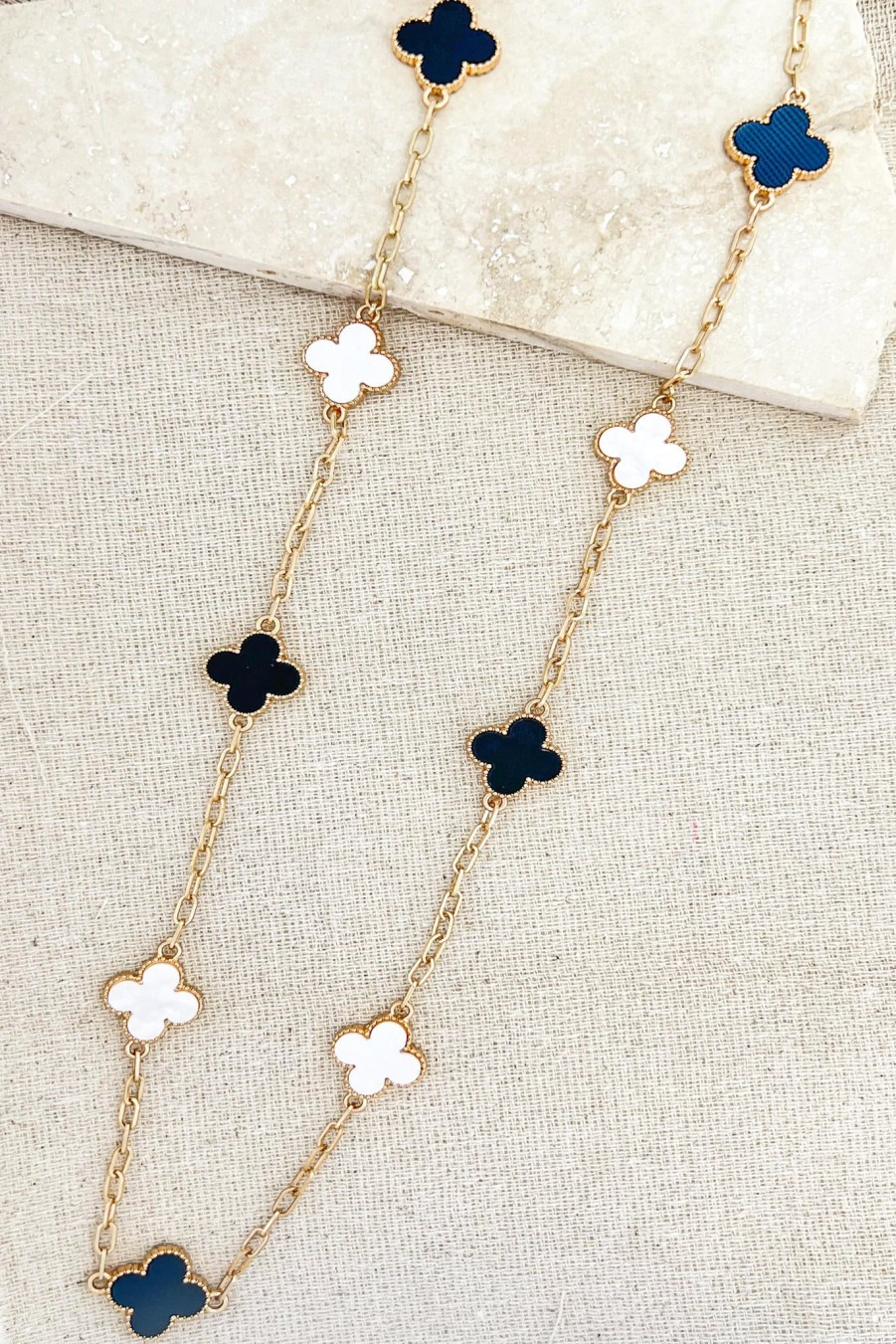 La Maison Necklaces | Envy Long Gold Necklace With Black And White Clover Detail - La Maison